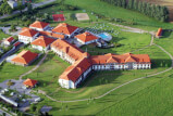 A high angle view of a building in a residential area